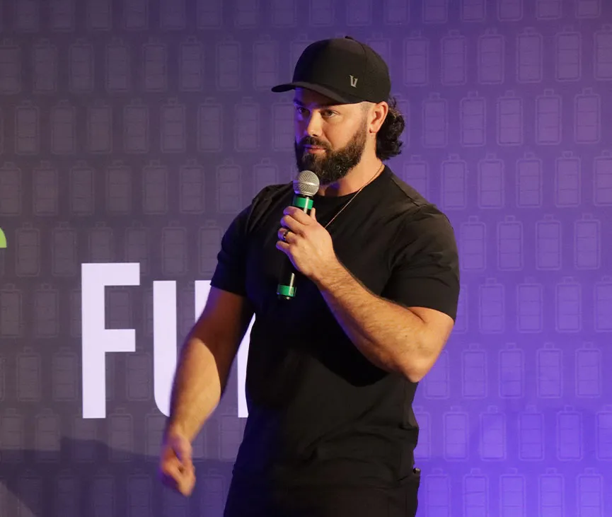 Fractional CMO executive speaking at marketing event stage